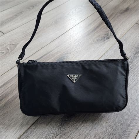 prada pochettte donna|prada bag with small pouch.